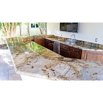 Restored outdoor travertine patio near a pool