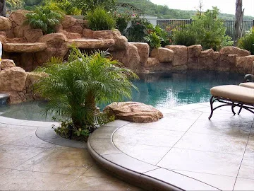 Travertine pool surround and coping cleaned in Orange County